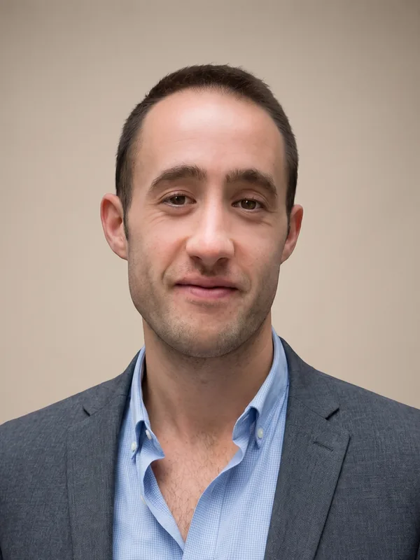 Dr. Alex Curmi